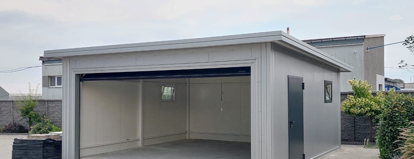 Insulated garage exterior on a paved driveway