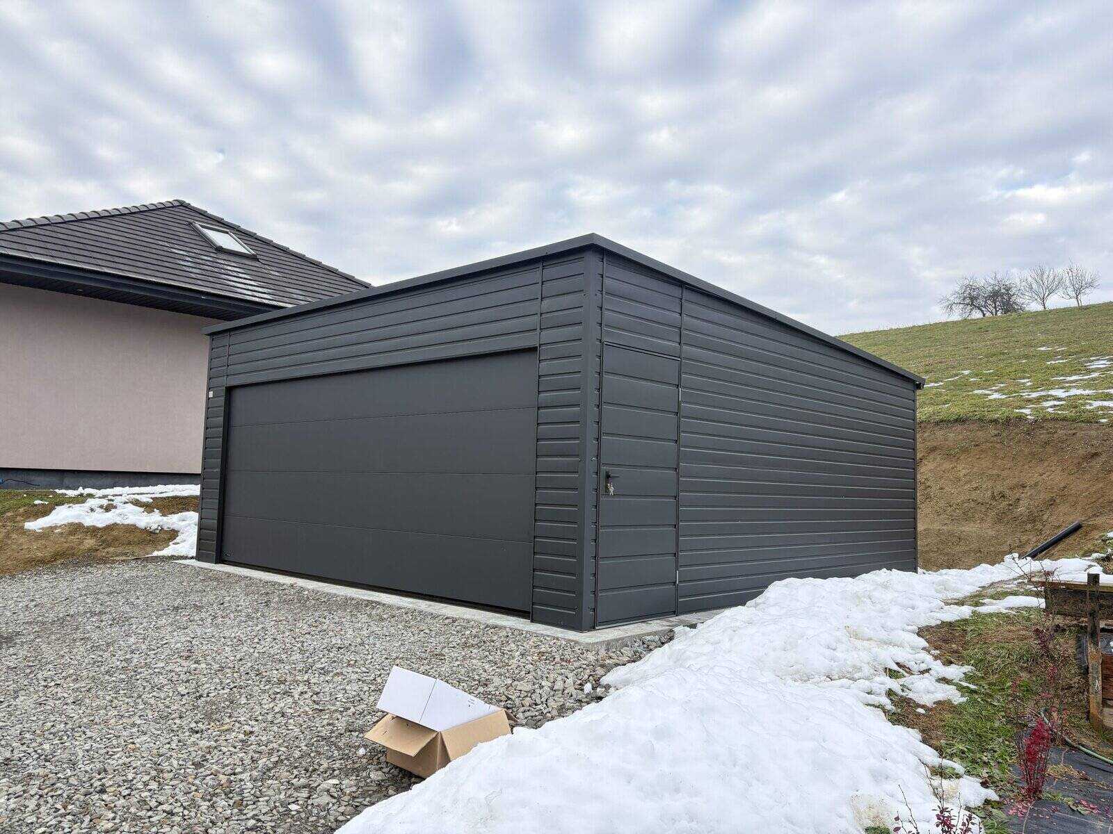 Anthracite steel garage, front elevation with sectional and personnel doors